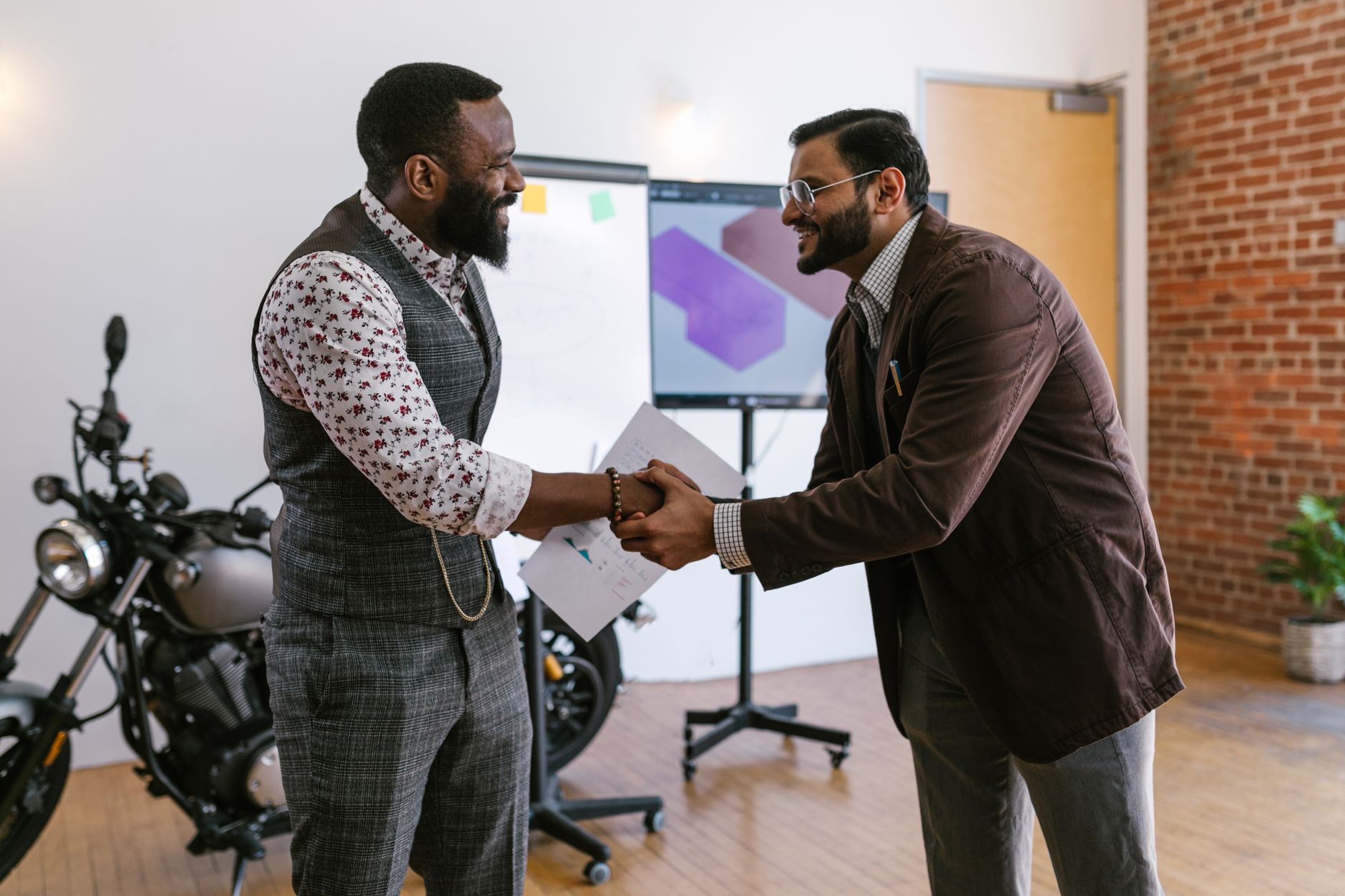 African startup founder pitching business idea to investors