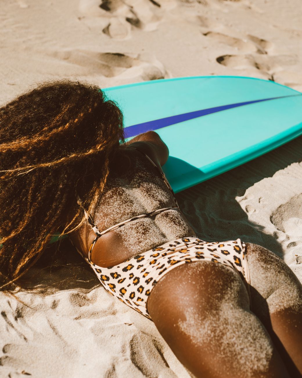 Colorful African print swimwear and outdoor clothing on beach setting