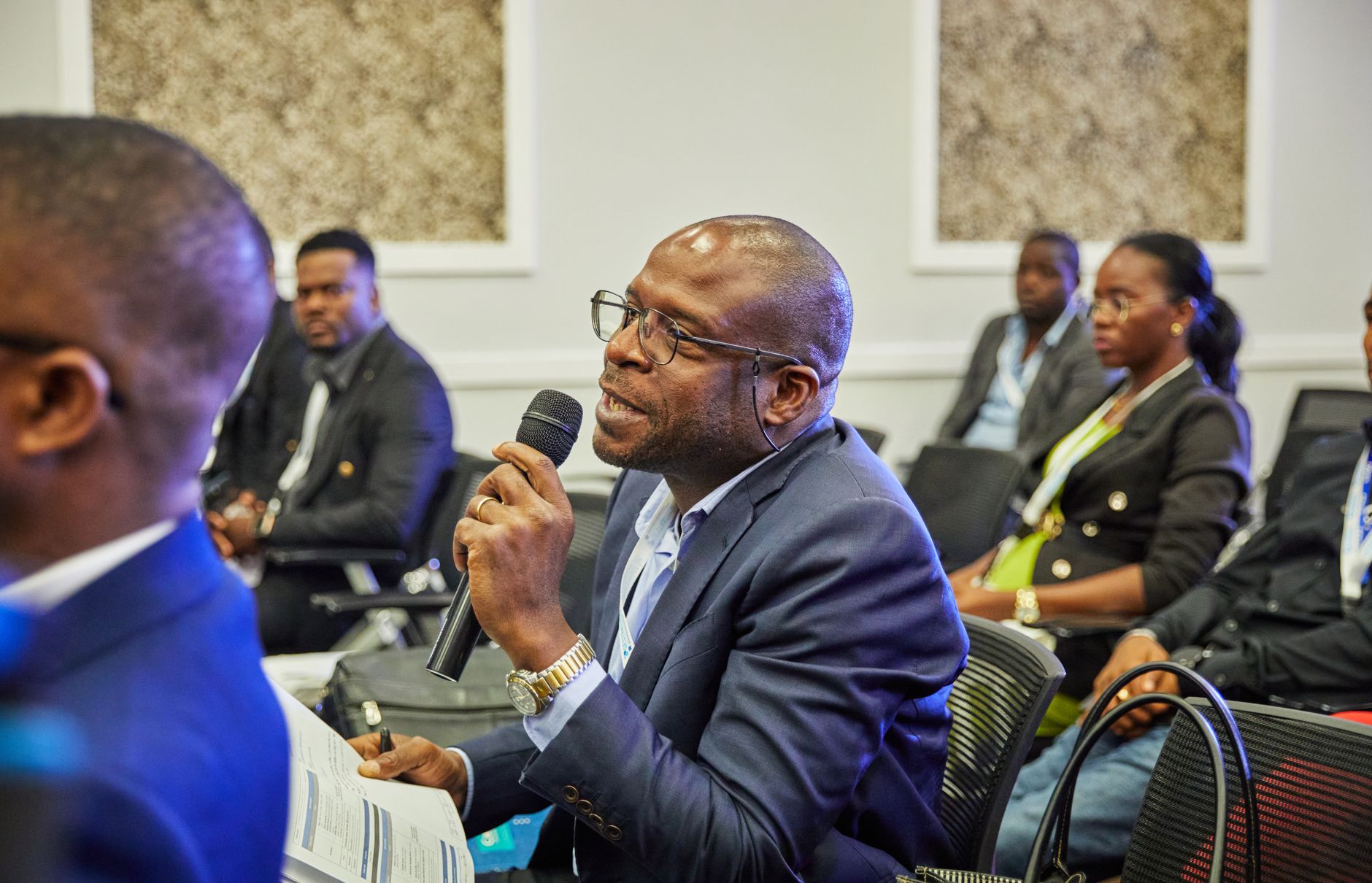 Tech conference panel discussion with African speakers on stage