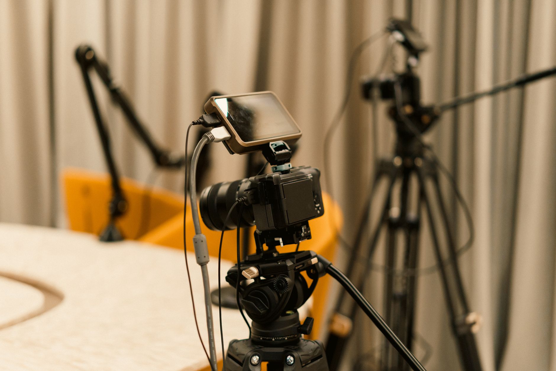 Live streaming setup with camera lights and donation alerts on screen