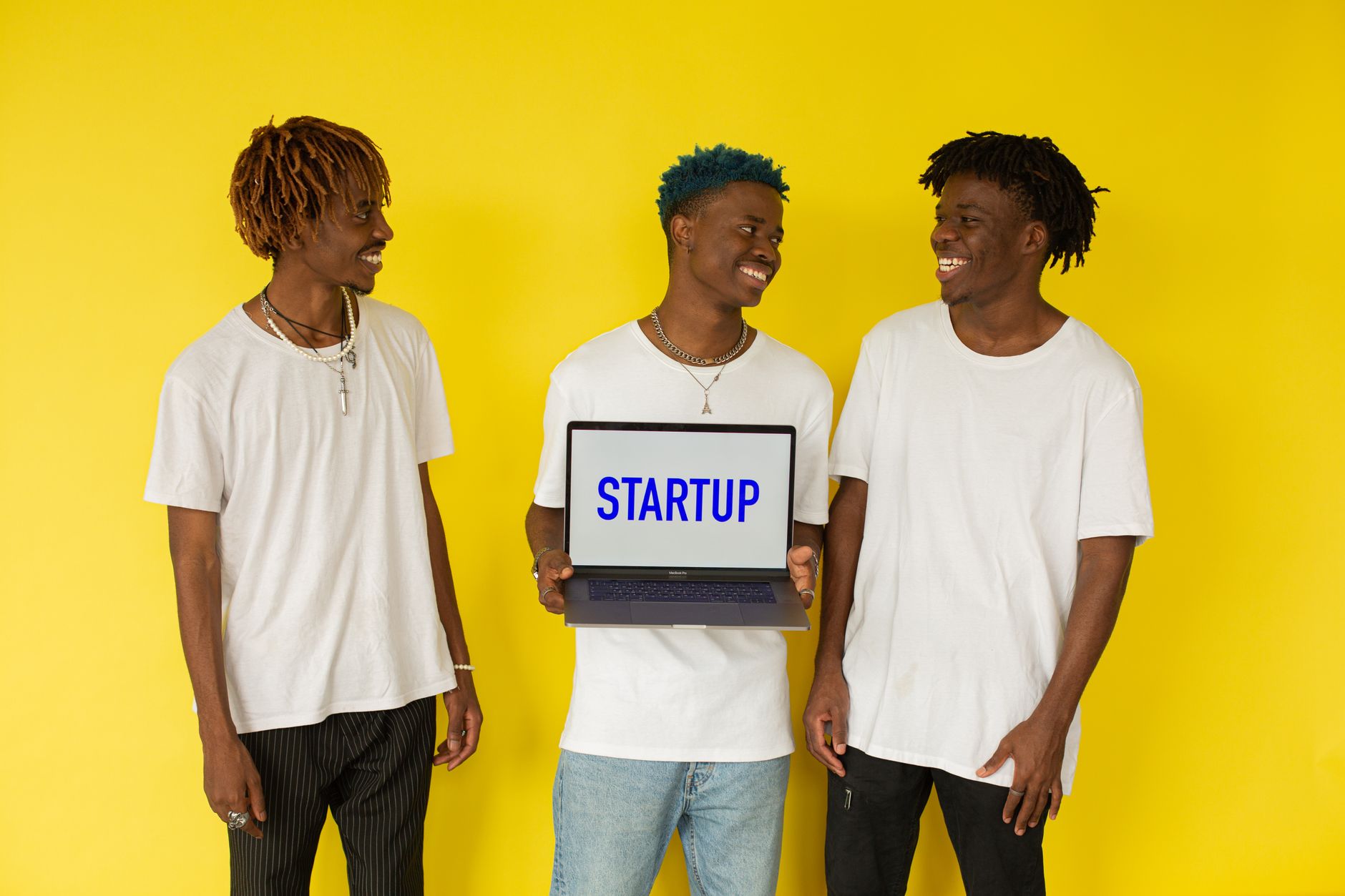 Group of young African entrepreneurs and creators at a pitch event in a modern hub