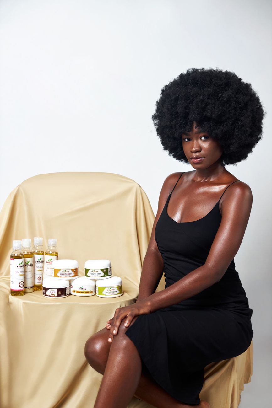 Natural African hair care products on a wooden surface