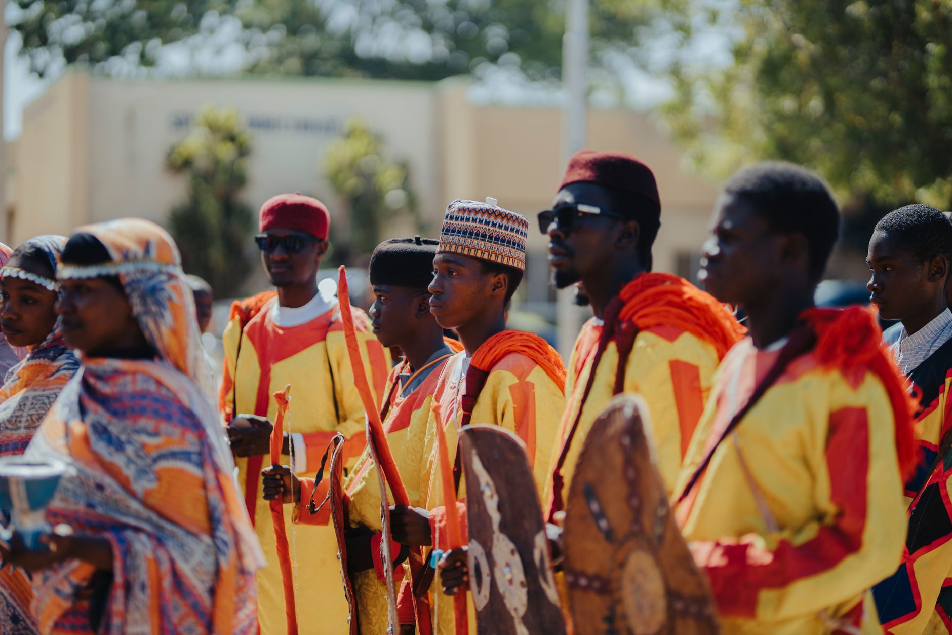 Community gathering in an African village representing Ubuntu philosophy