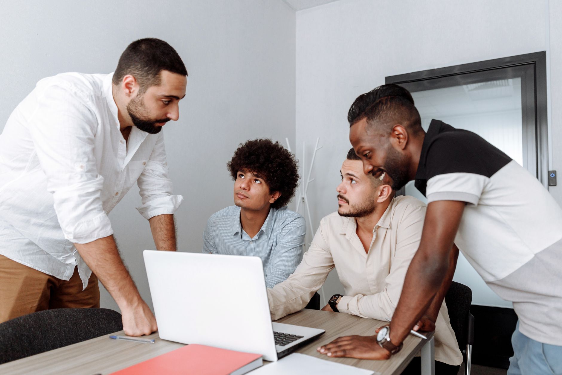 African startup founders collaborating on a digital platform product