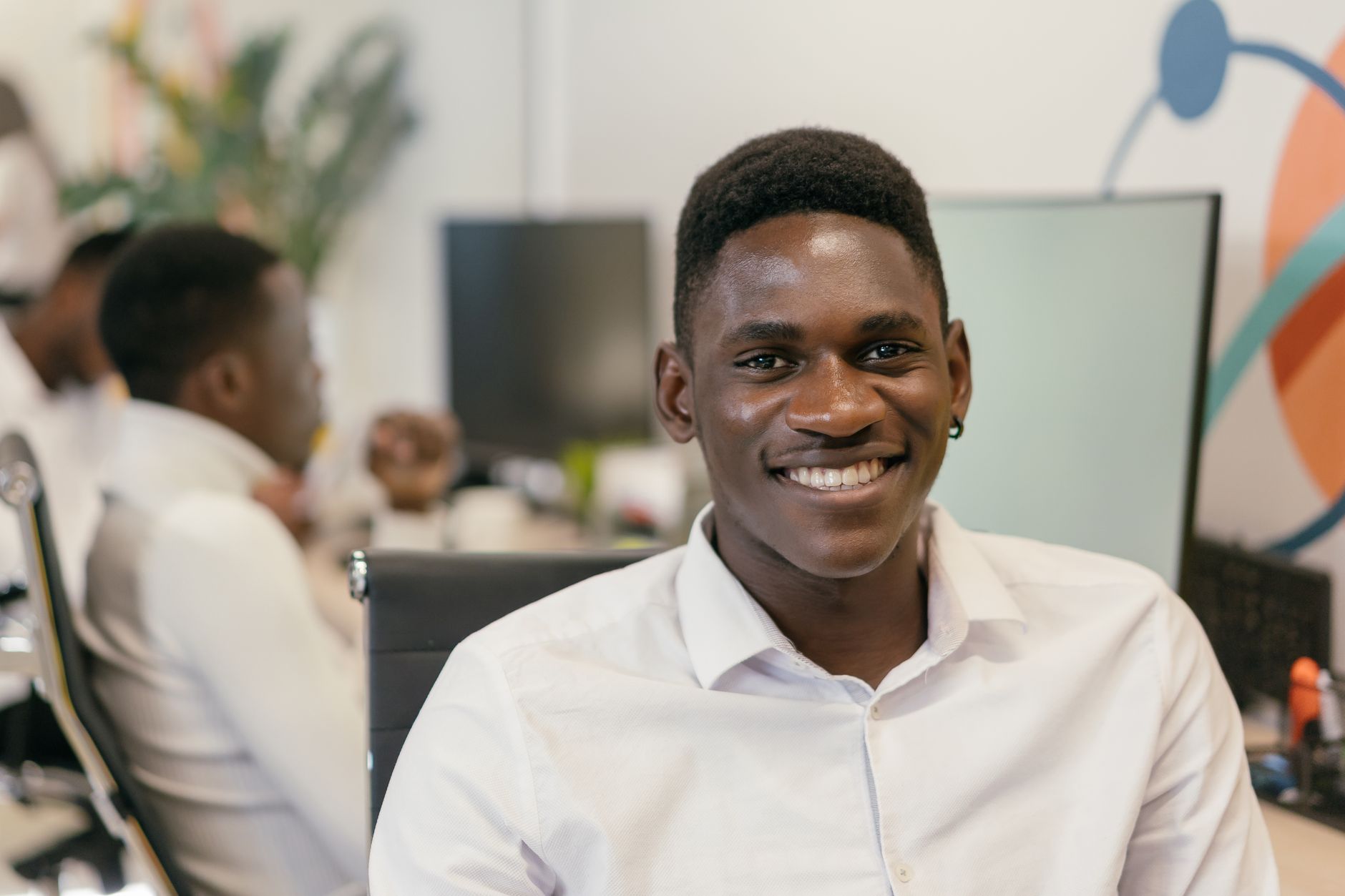 African entrepreneur reviewing startup funding documents and financial charts
