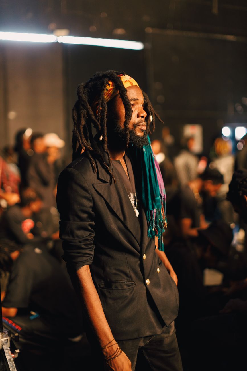 Afrobeats concert crowd with colorful stage lighting in Africa