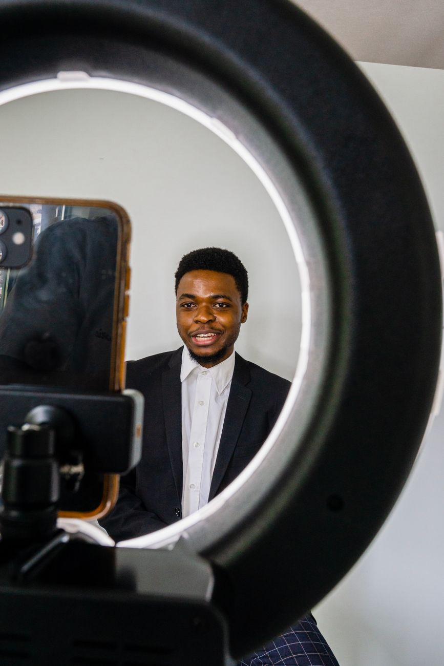 African content creators filming video content in a modern studio
