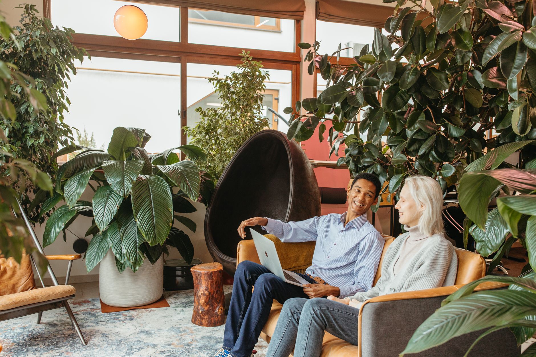 African startup founders collaborating in a modern co-working space