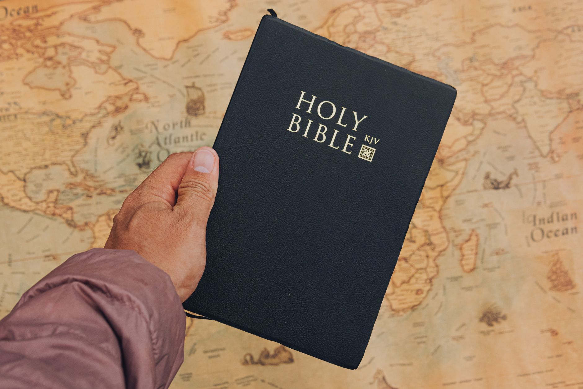 Classic leather KJV Bible with ornate typography and ribbons