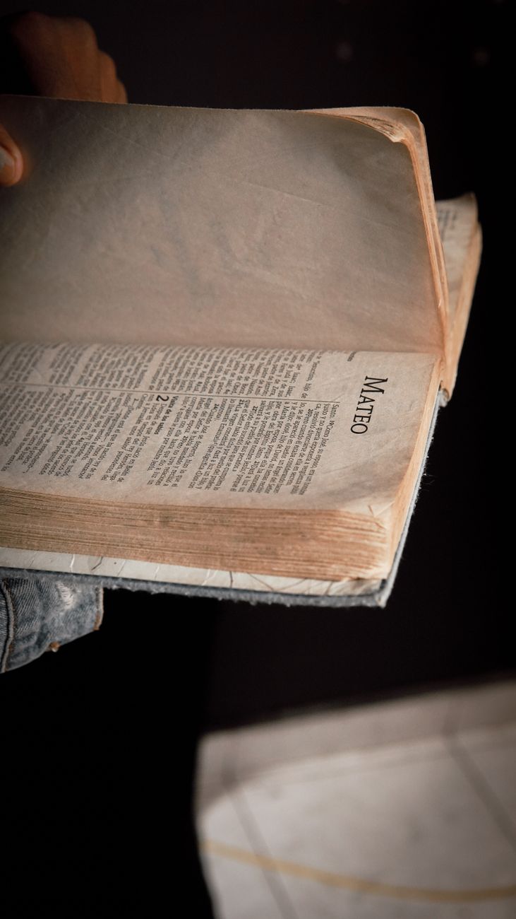 Open Bible showing Old and New Testament pages side by side