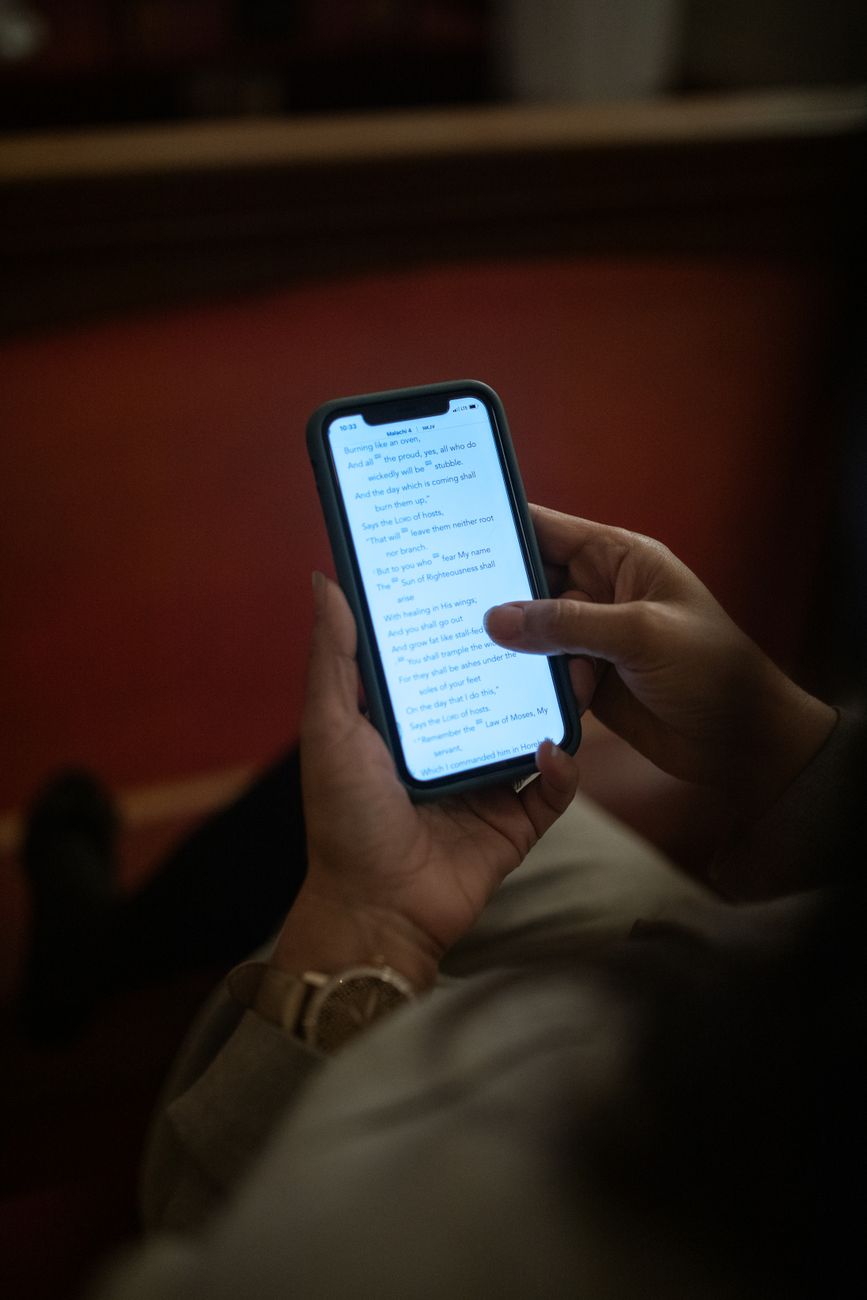 Mobile quiz interface with Bible study questions and multiple choice answers