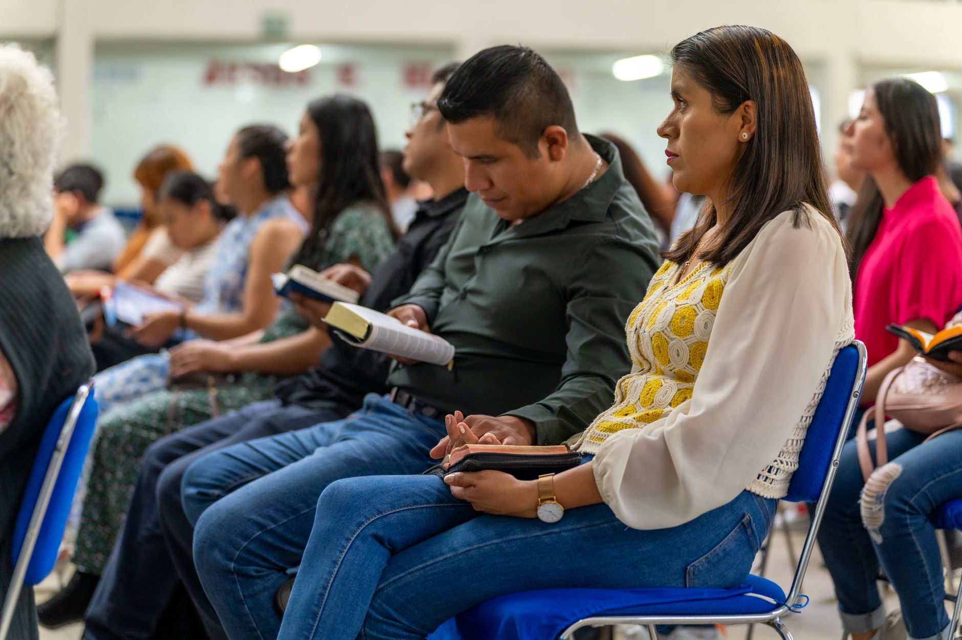 Group of people sharing Bible study insights on their smartphones