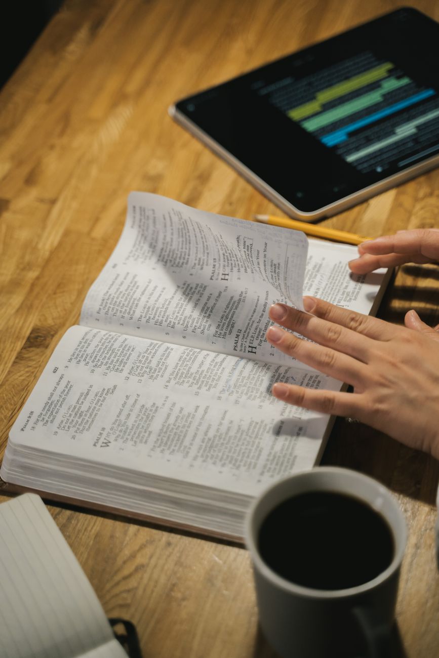 Bible app interface showing split screen cross reference view