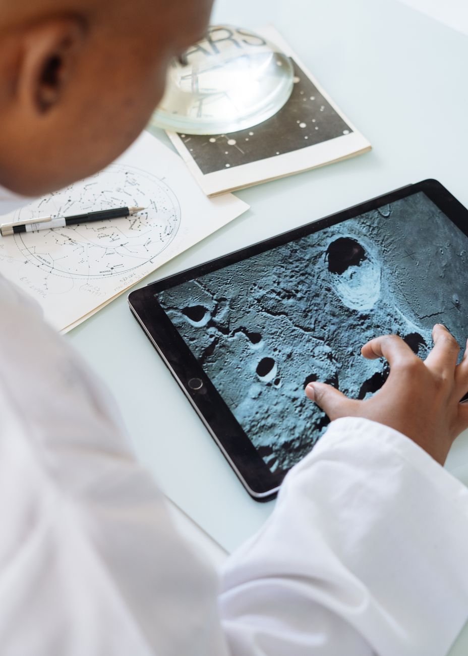 Person studying Bible with digital map on tablet showing ancient routes