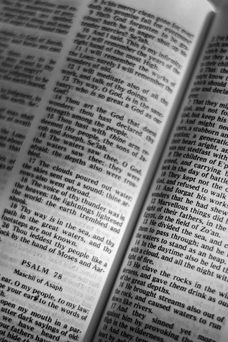Split-screen Bible study showing Old Testament and New Testament parallel passages side by side