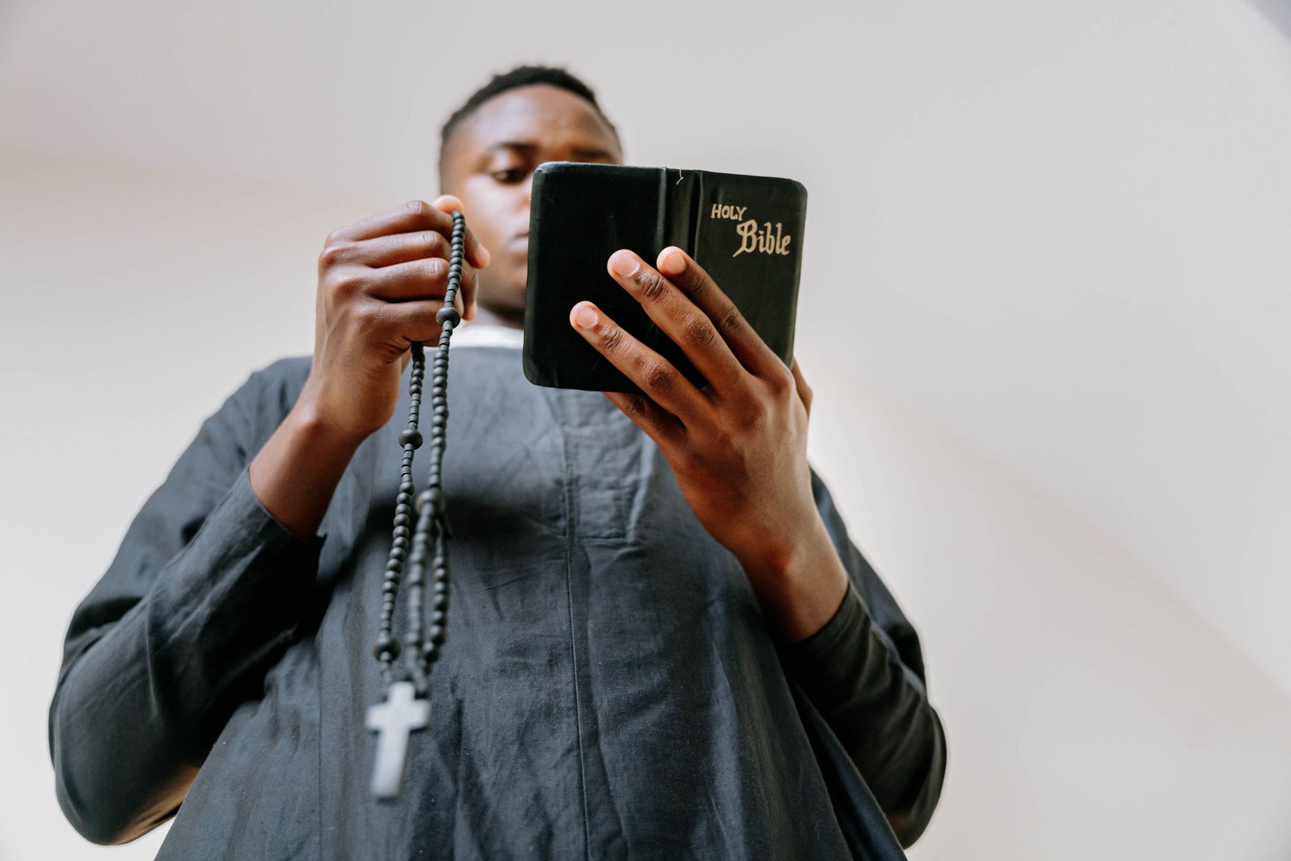 Person reading Bible on smartphone with a clean, distraction-free screen