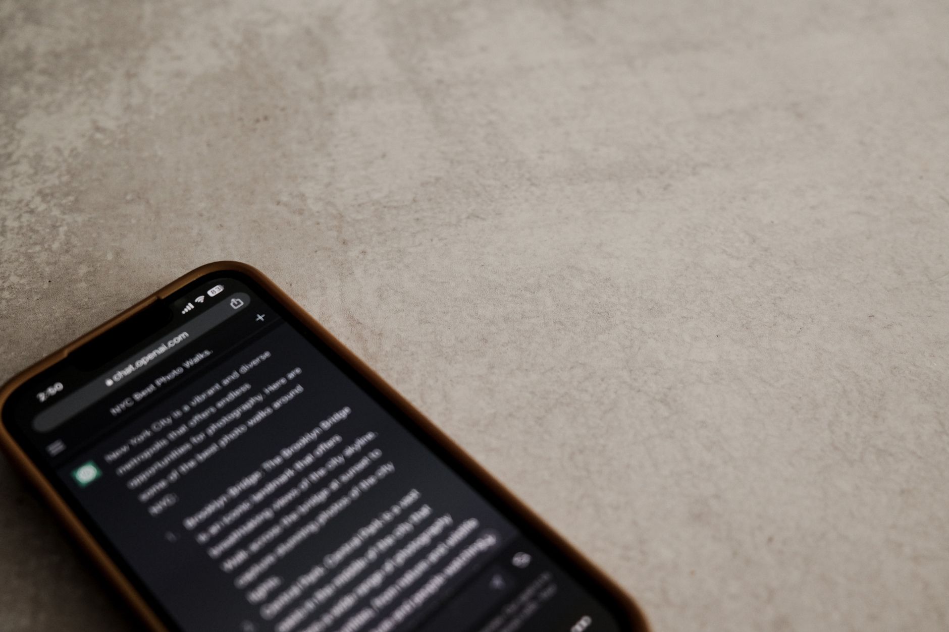 YouVersion Bible App logo displayed on a smartphone screen with open Bible nearby