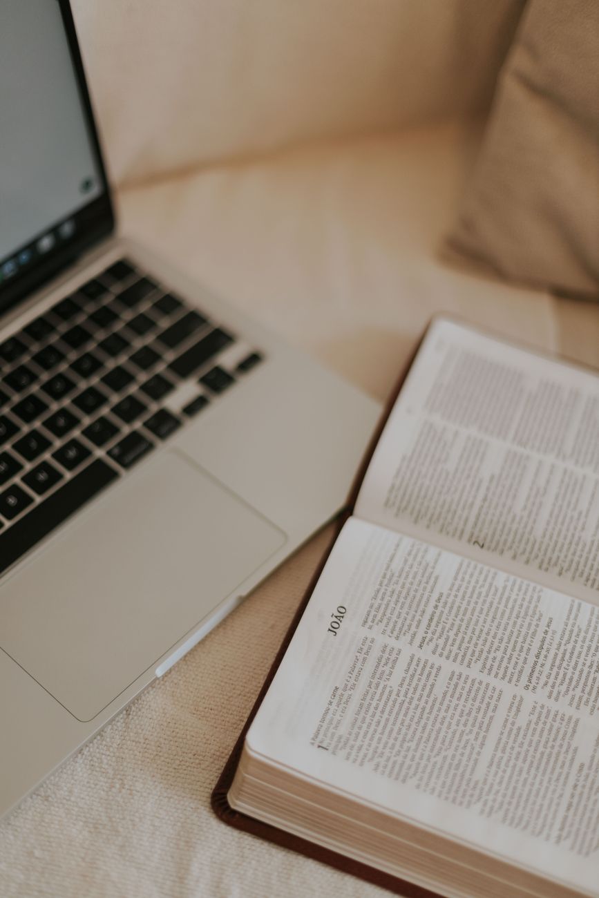 Bible Gateway website open on a laptop showing scripture search results