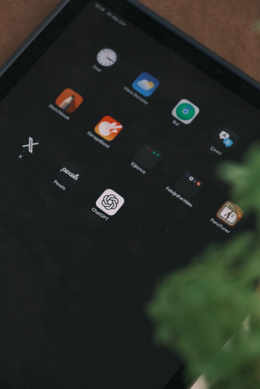 Olive Tree Bible App showing split screen view of Bible text and commentary on tablet