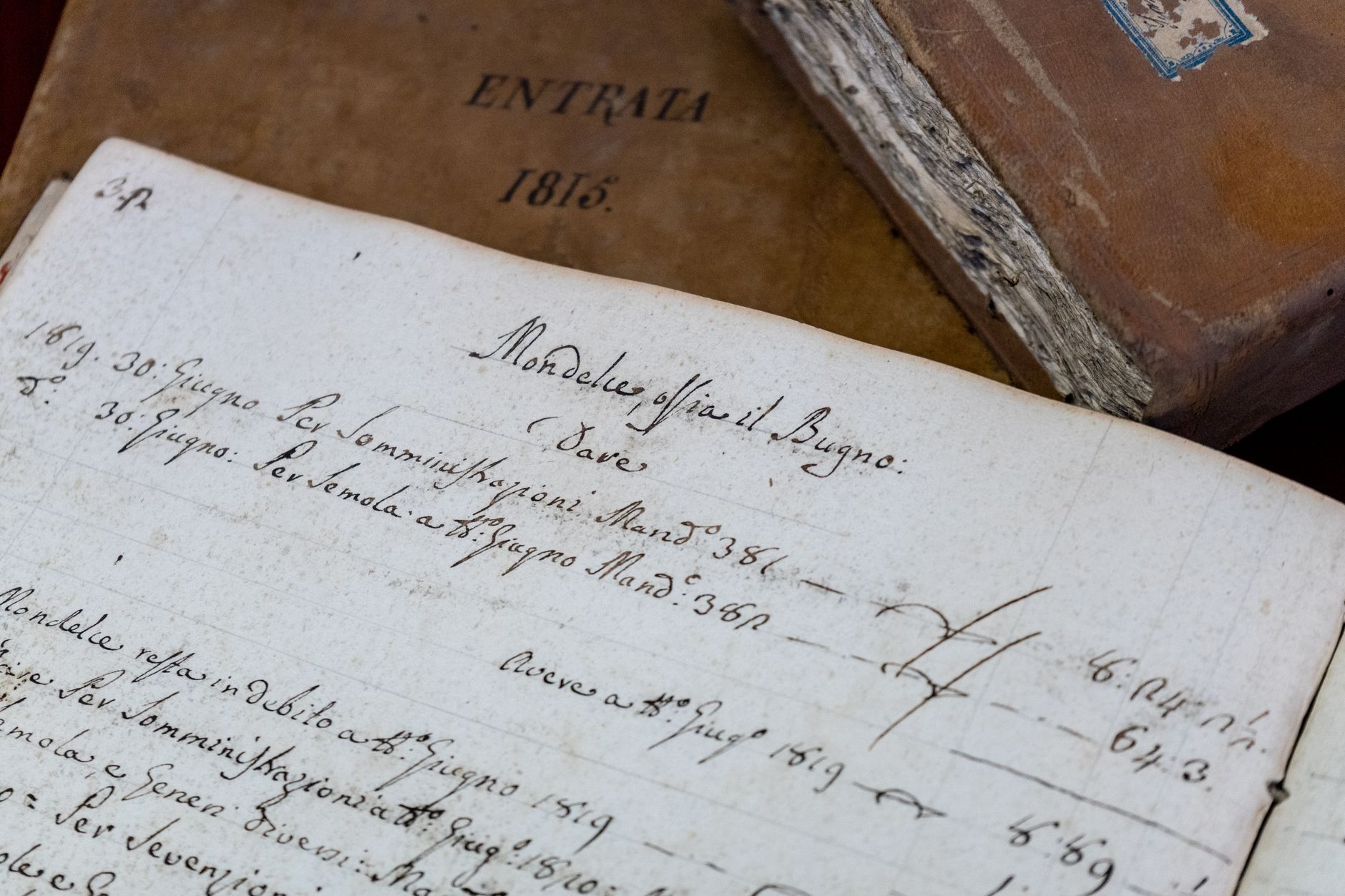Ancient Greek manuscript of the New Testament open on a research desk