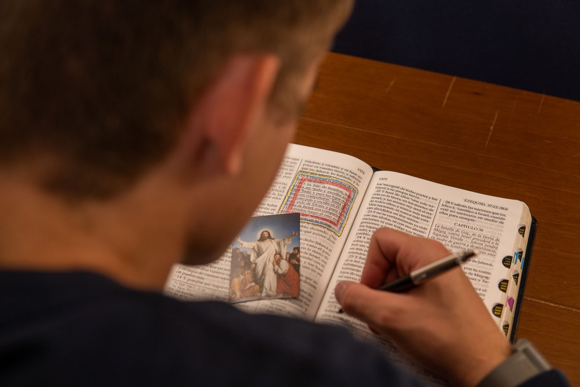 Open Bible with cross reference notes in the margin
