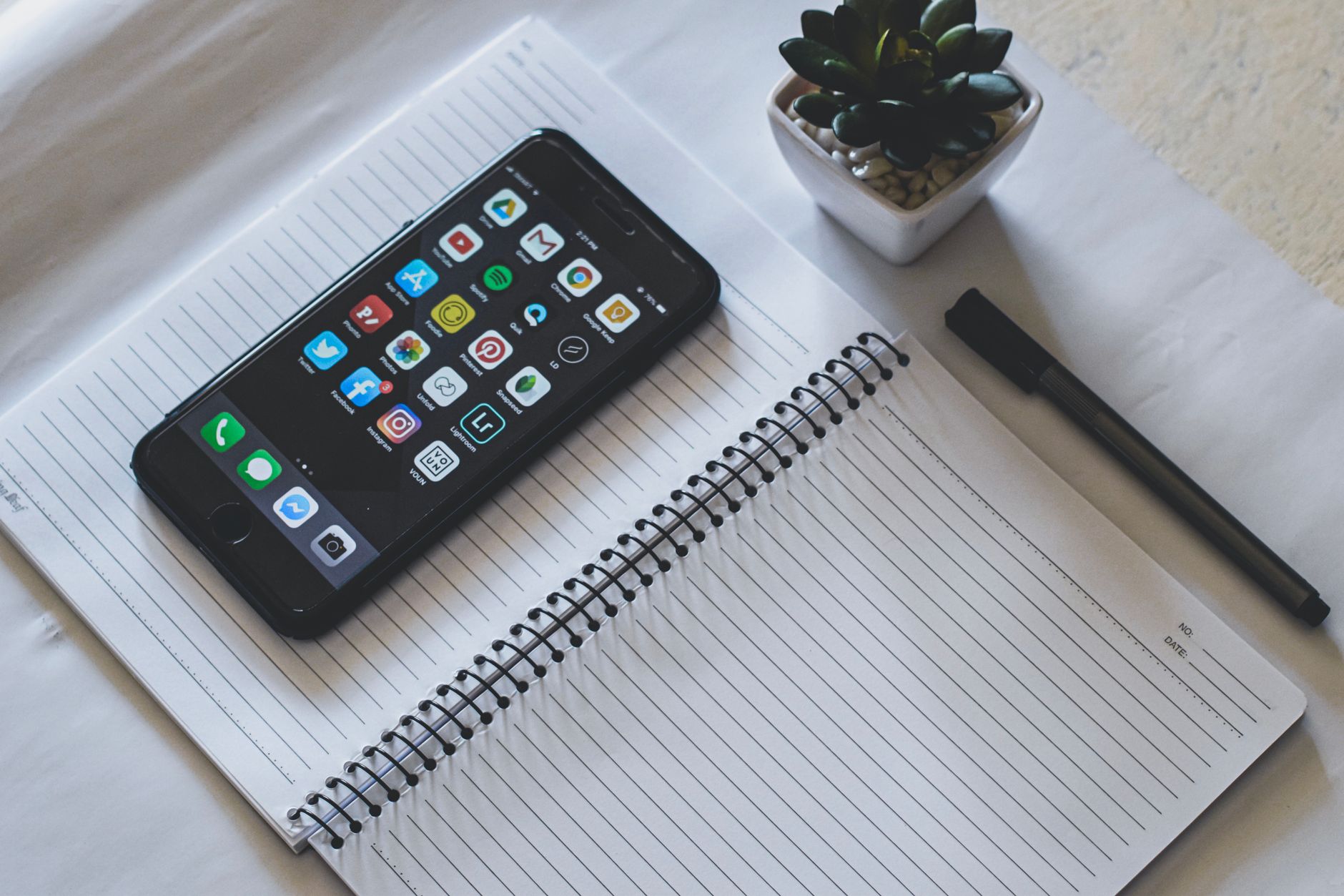 Smartphone displaying a Bible study app with scripture text