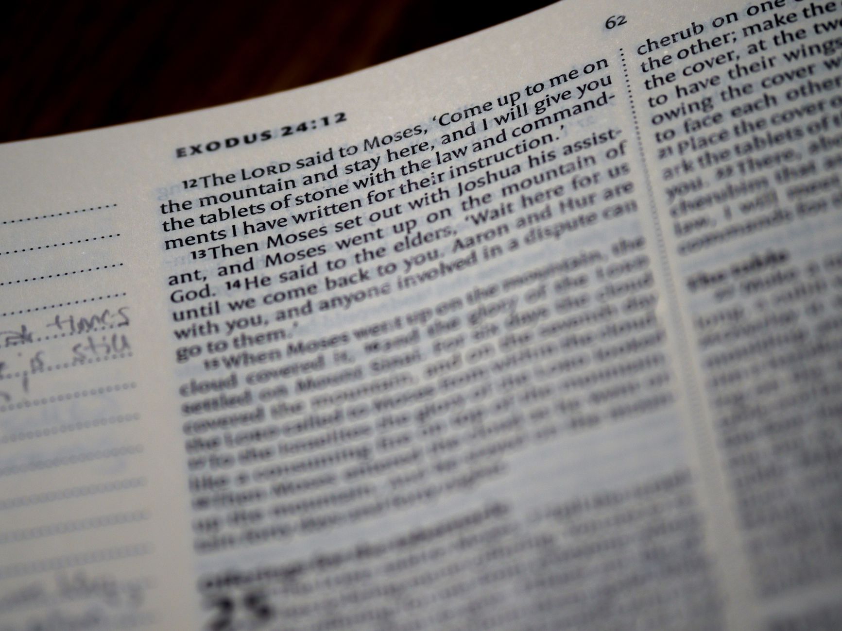 Open Bible with highlighted cross reference passages and study notes