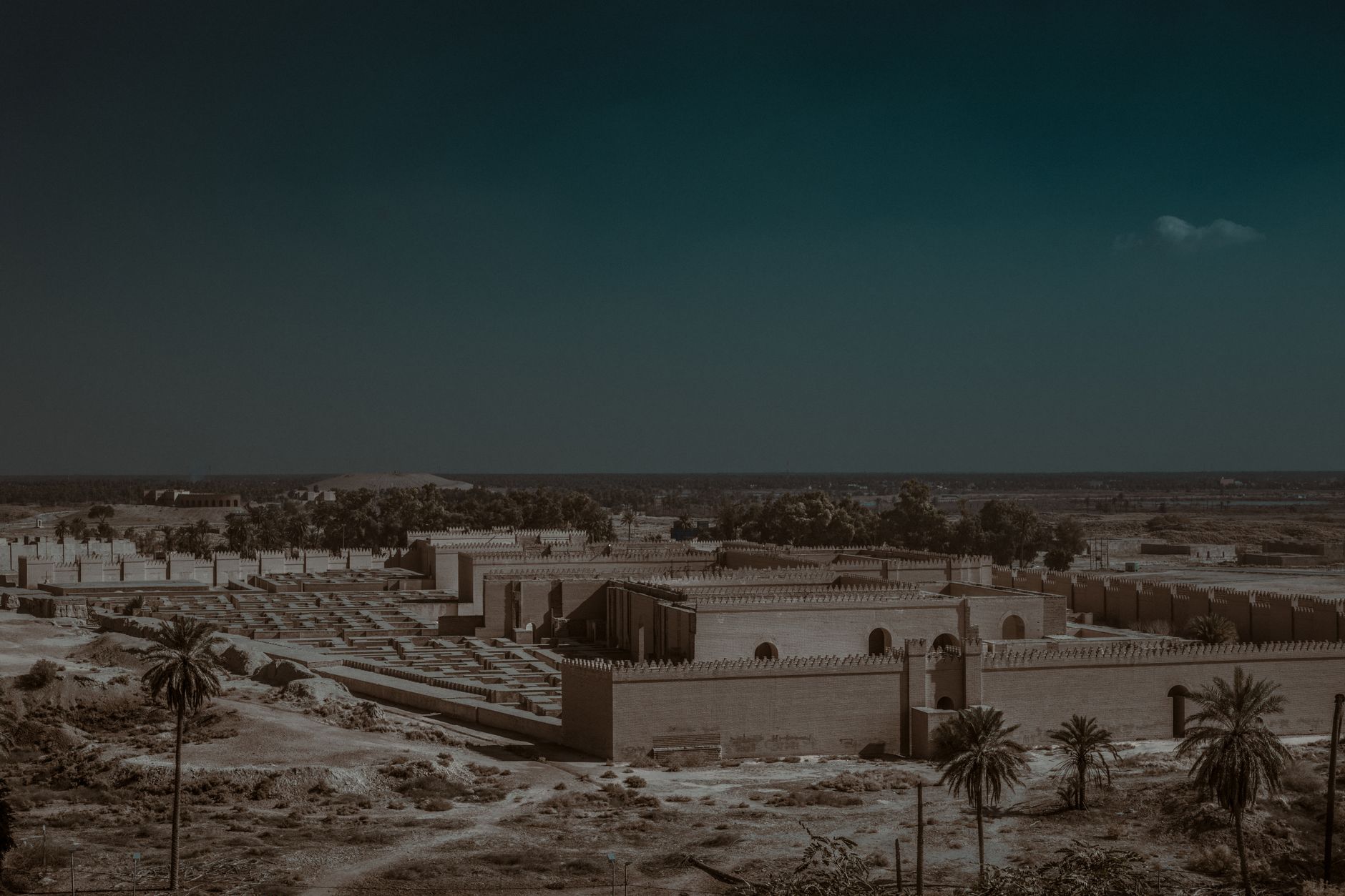 Ancient city of Babylon ruins with desert landscape representing biblical historical setting