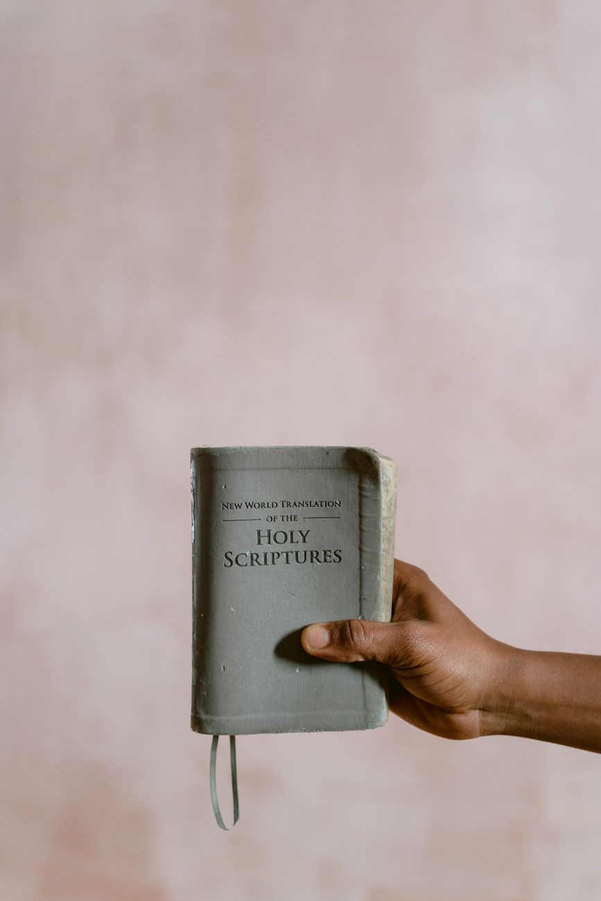 Open Bible with multiple translation tabs on a digital device