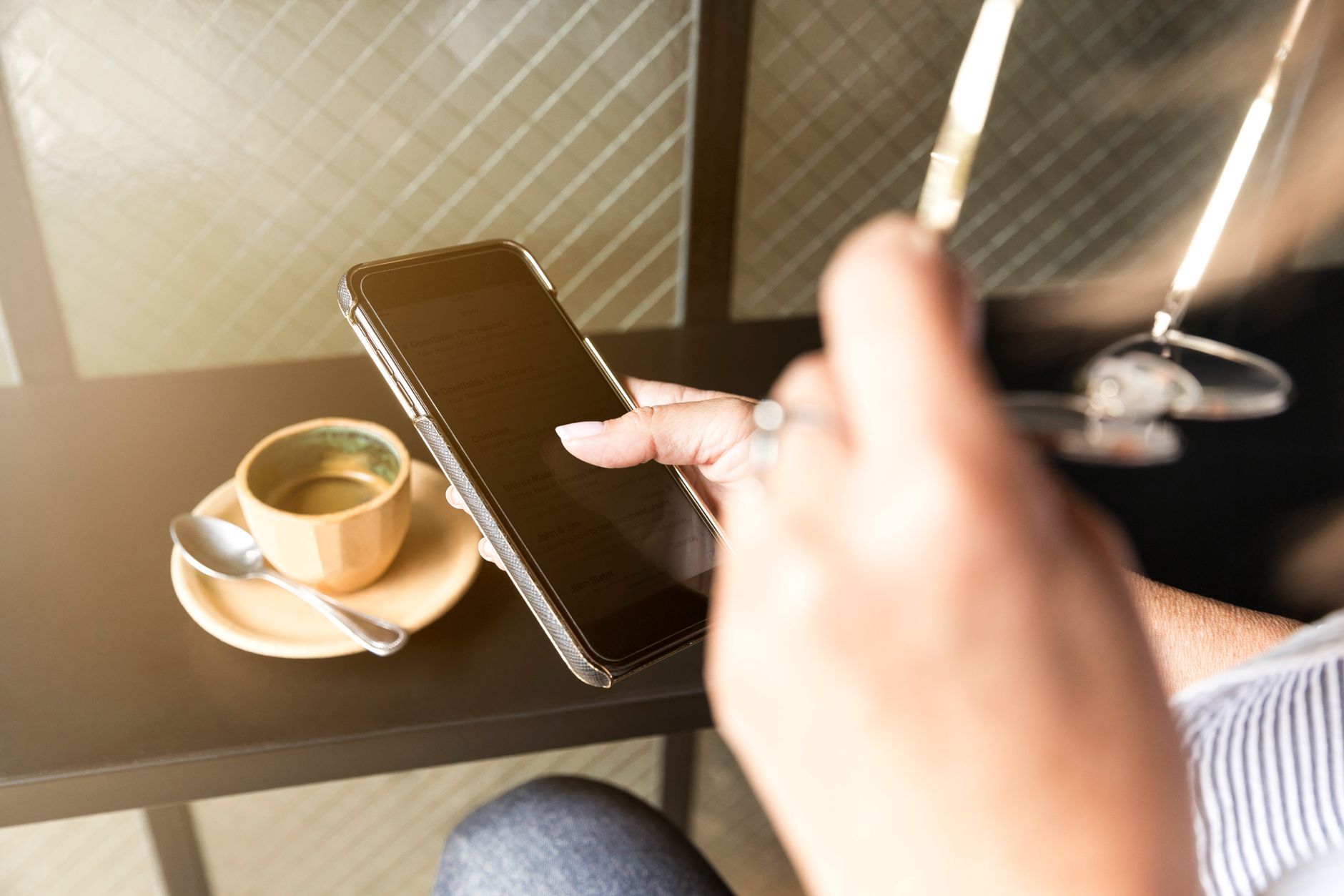 Person using a Bible study app on a smartphone